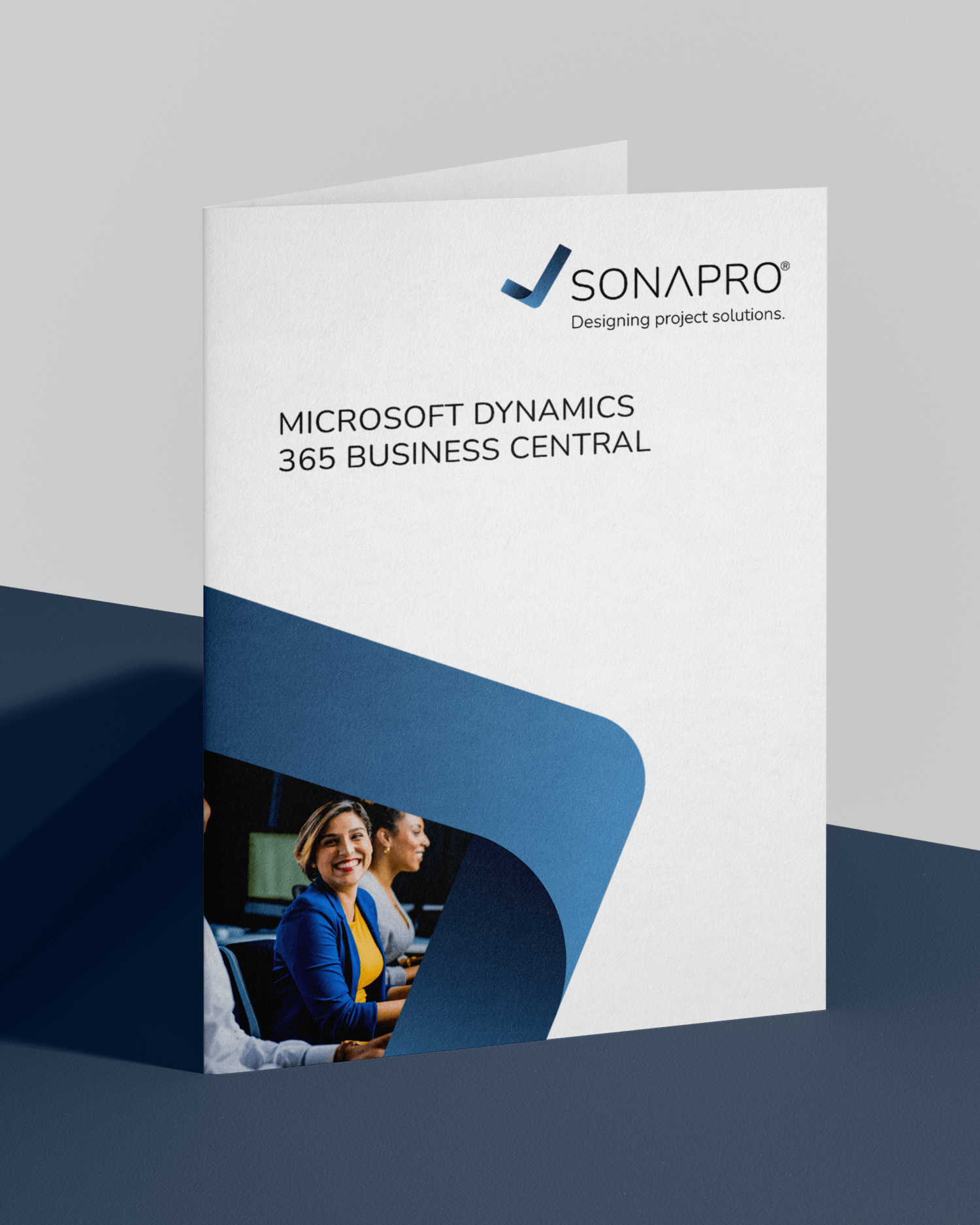 Das Bild zeigt die Business Central Broschüre auf dunklem Tisch und hellem Hintergrund